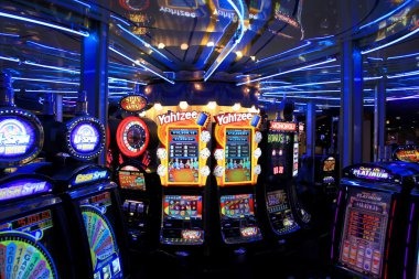 Multi-angle Casino Hold'em studio on slot 367 showing live dealer, card shuffle, and community board display